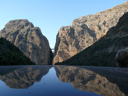Magnificent Scenery of El Chorro with Gaitanes Gorge and Camino del Rey Bridge in the Background Magnificent Scenery of El Chorro with Gaitanes Gorge and Camino del Rey Bridge in the Background, Photo by goesberlin, Flickr