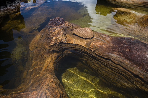 Eroded Surface of the Oldest Rock Formation in the World with Water Puddles, Photo: antonioperezrio.com, Flickr