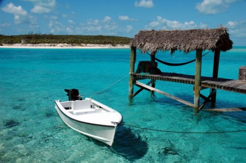 Pier and Rowboat Scene from the Bahamas, Photo: Jpatokal, WikiTravel