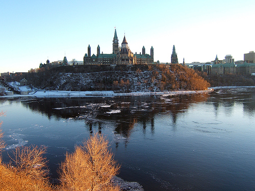 Parliament Hill reflecting on the Ottawa River, Photo: Vince Alongi, Flickr