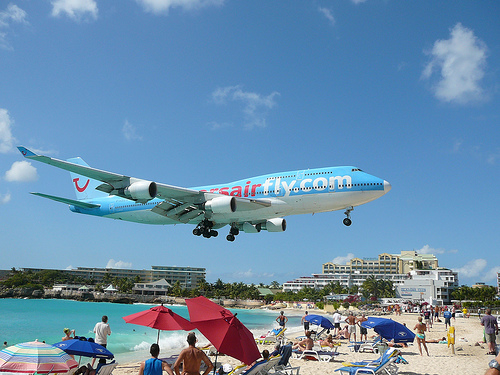 Maho Beach in St. Maarten - Boeing 747 Aircraft Landing at the Airport