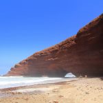 View of Natural Arches on Legzira Beach from Distance, Photo by Just Booked A Trip, Flickr