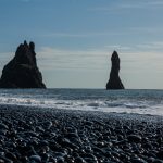 Guardians of the Sea: The Rocky Outcrops of Reynisfjara Beach